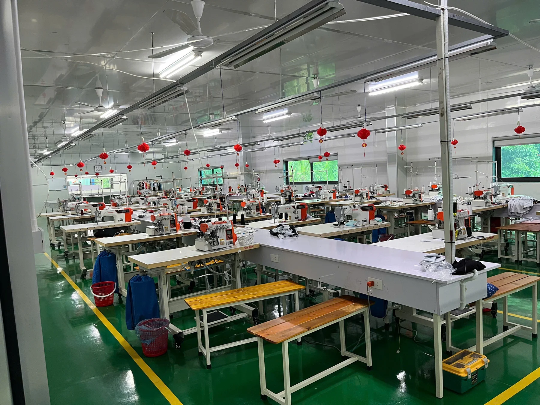 Sewing machines and production stations at the Onos factory